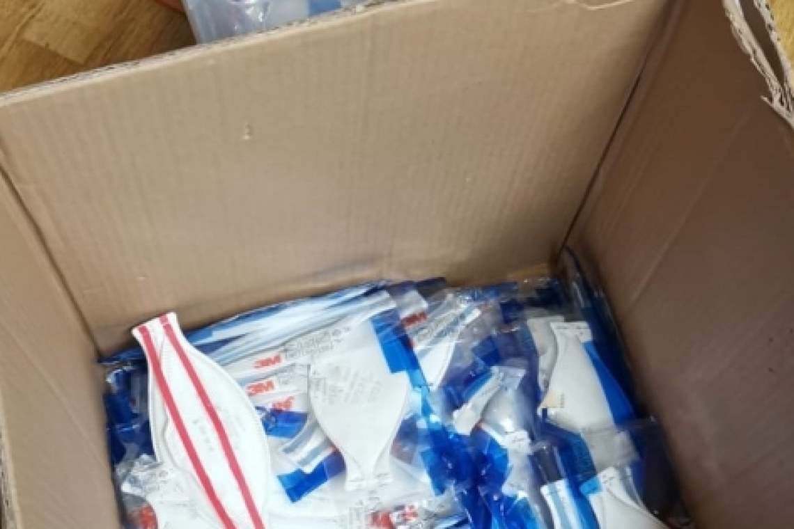 Percheziții la furnizori de măști de protecție contrafăcute