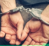 Polițist din Covasna, arestat preventiv pentru că ar fi întreținut relații sexuale cu două minore și pentru pornografie infantilă