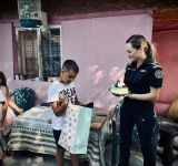 Petrecere surpriză organizată de polițiștii prahoveni pentru Marian, un copil de 7 ani, din satul Sicrita