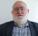 Fostul profesor de la SNSPA Alfred Bulai a fost reținut pentru agresiune sexuală și folosirea abuzivă a funcției